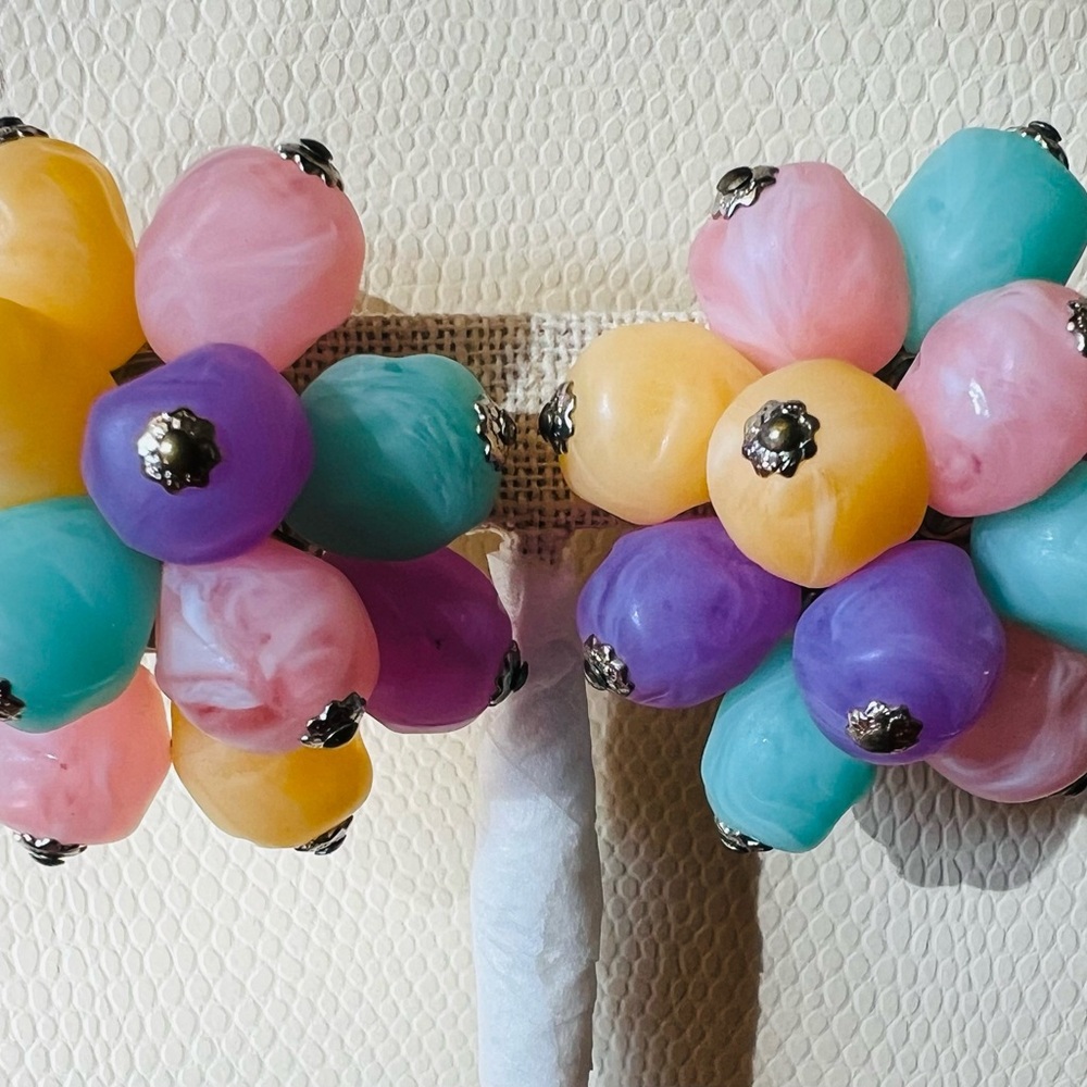 Fun pastel colored clip on earrings.